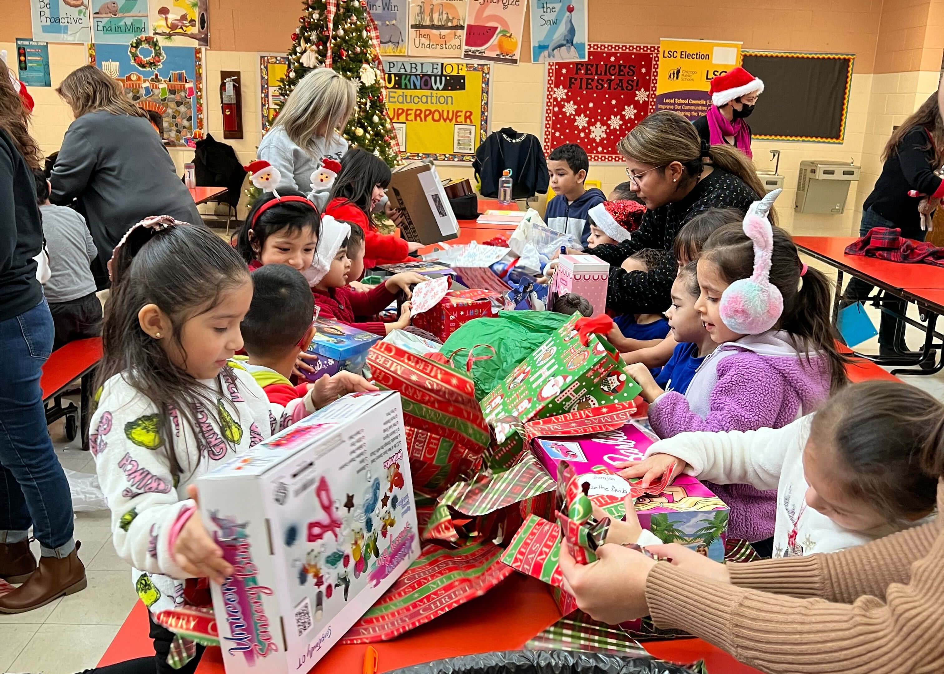 Relativians helping wrap gifts for our Holiday Letters campaign